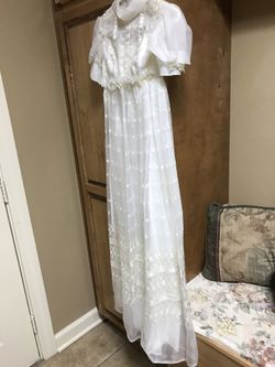 Wedding dress with 8 foot train and veil Excellent shape. Call for more information