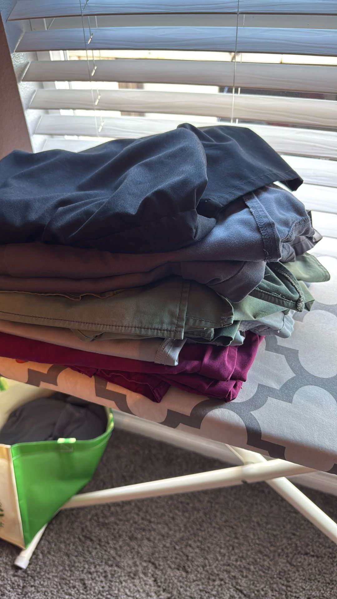 4 Sets of scrubs plus one scrub top