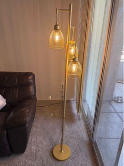 Gold floor lamp with adjustable brightness
