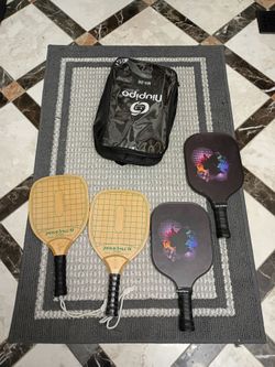 Lot of 4 pickleball paddles