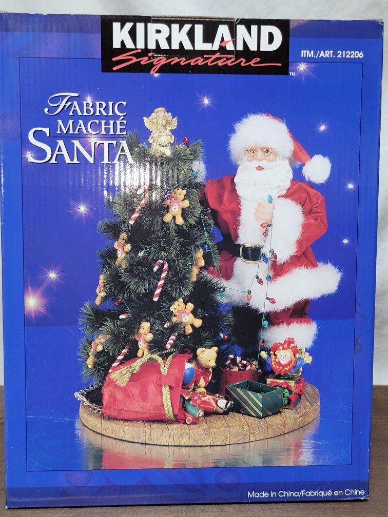  Kirkland Signature Santa Figurine stringing lights