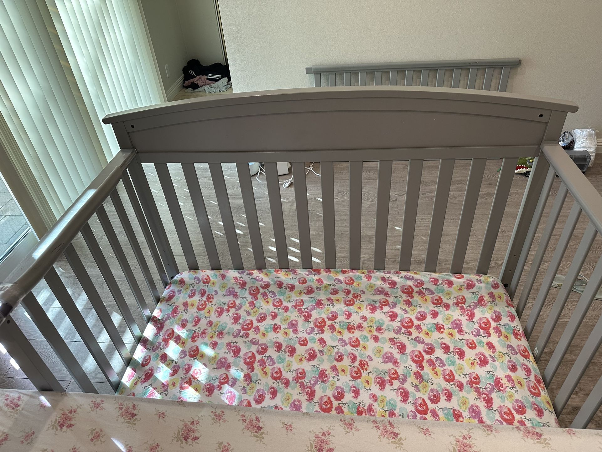 Graco baby convertible crib and mattress.