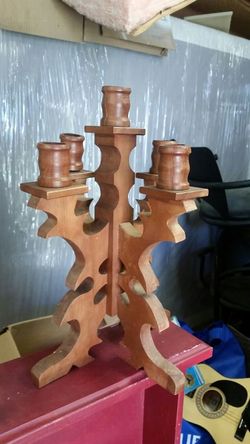 Antique wooden candle holder holds 5 candles
