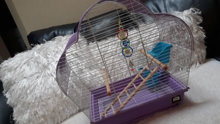 Small purple bird cage