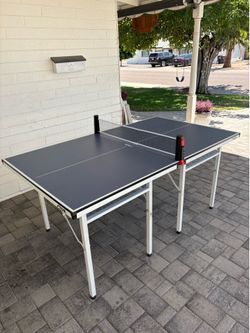 Stiga folding space saver ping pong table and set