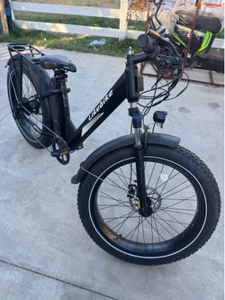 E-bike 70 miles range dat tire two seats