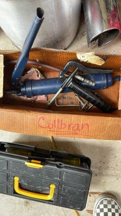 Two Grease Guns