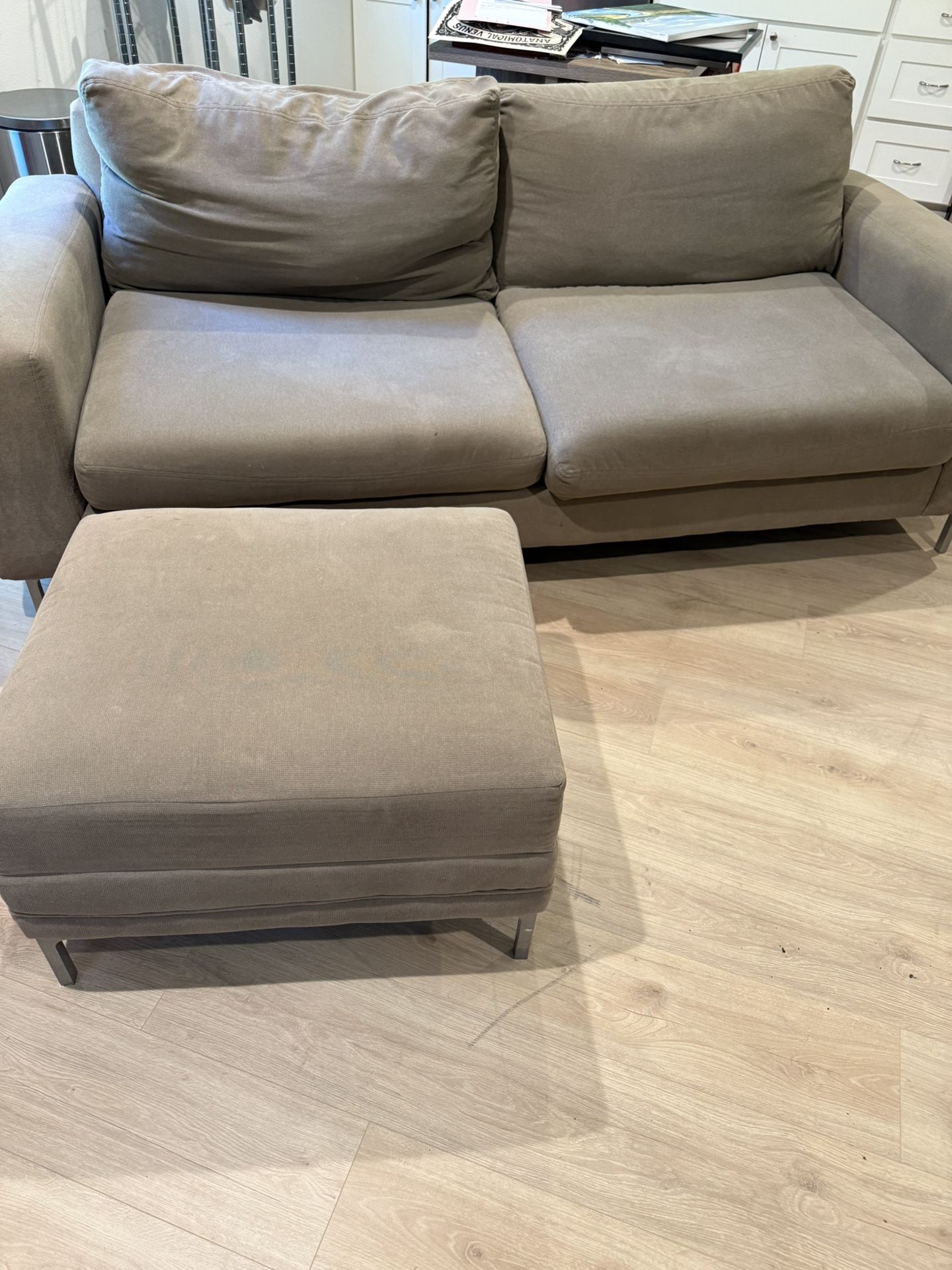 Tan Couch And Ottoman