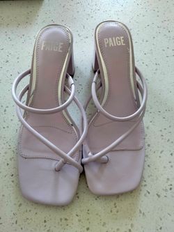 These are lilac Paige Vanessa sandals featuring a block heel and a square toe.