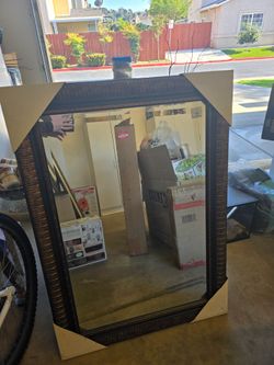 Large Wall Mirror with Ornate Dark Frame
