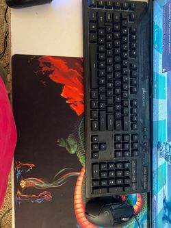 Gaming Corsair keyboard and Logitech 702 mouse