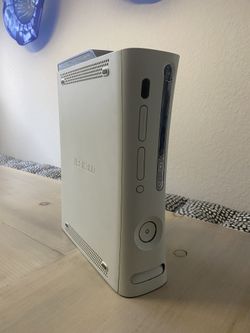XBOX 360 with 9 games and 1 controller