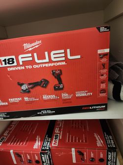 GRINDER ,IMPACT WRENCH 2X 5.0 XC BATTERY CHARGER AND BAG