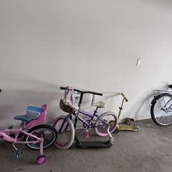 2 Girl’s Bikes, 1 Baby Scooter, 1 Scooter, And 1 Bike