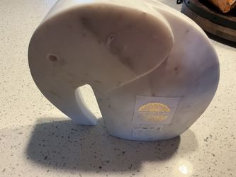 A new, beautiful , heavy, marble white elephant (8” tall x 9” long)