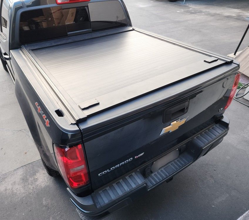 SyneticUSA 2007-2024 Chevy Silverado/GMC Sierra Hard Aluminum Retractable Tonneau Cover For 5.8ft Short Bed