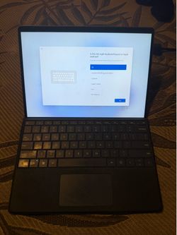 Microsoft Surface Pro 9 (i5, 8GB RAM, 256GB SSD) with the keyboard,