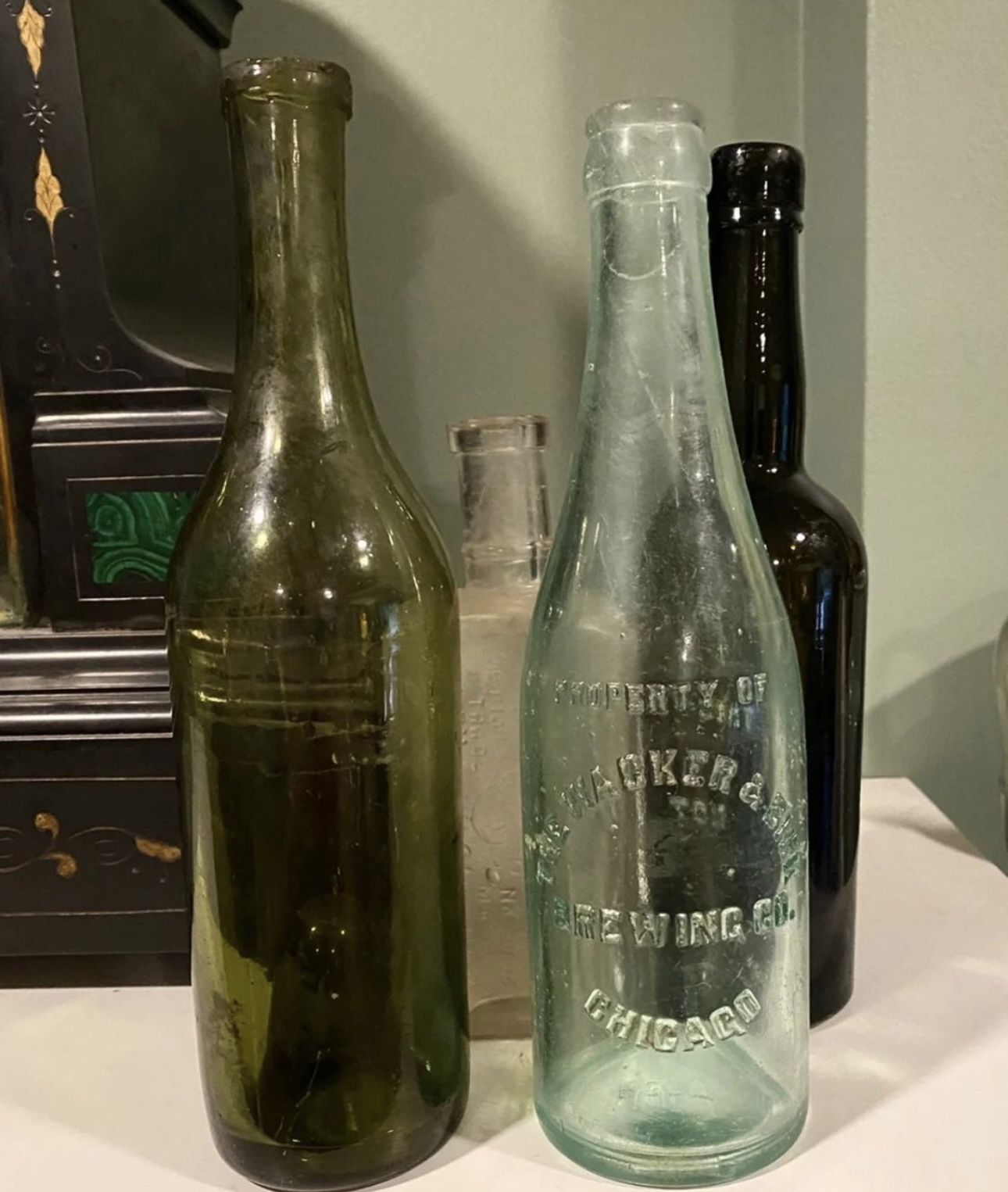 Four Antique Bottoes - one Blown Glass
