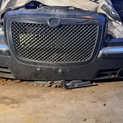 2005-2010 Chrysler 300C/SRT Front Bumper Plus Custom Gril And Fog Lights. Black.