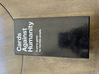 Cards Against Humanity And Monopoly Board Games