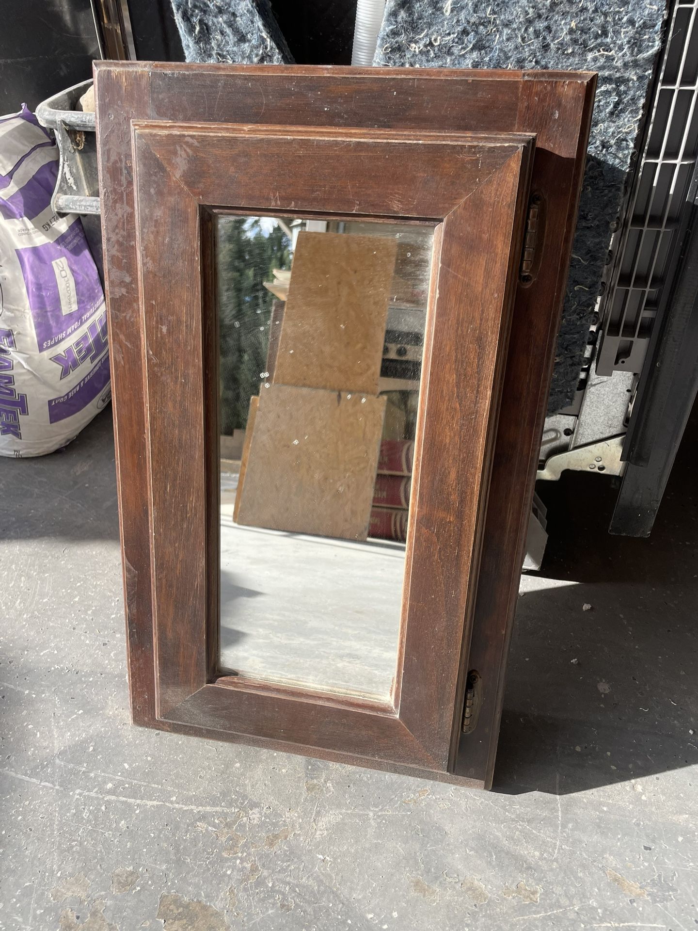 Wooden cabinet with mirror