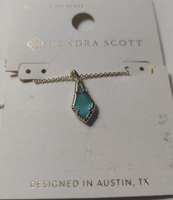 Kendra Scott Teresa necklace in gold with a green teal pendant