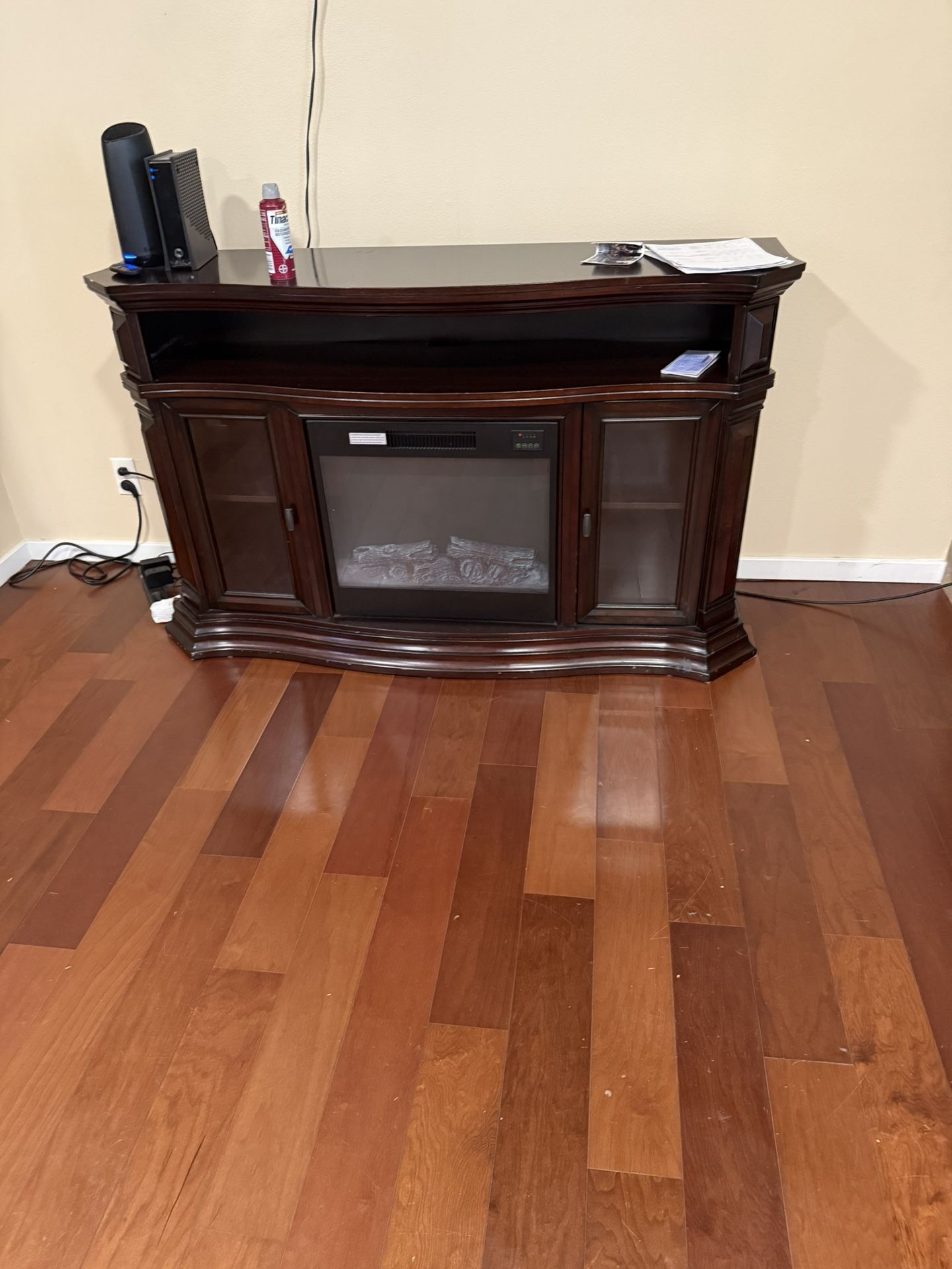 Dark Brown TV Stand With Fire Place Heater And Cabinet
