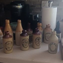 Antique Crocks- Western Pottery, Ginger Beer Bottles, Various Advertising,  And Various Sizes.