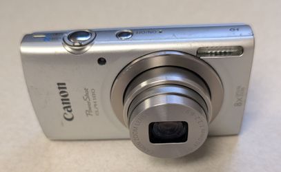 Silver Canon PowerShot ELPH 180 digital camera with charger & battery.