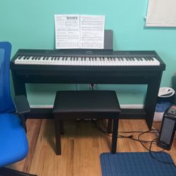 Donner Dep 20 Piano and Bench 