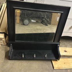 Black Mirror and Wall Shelf