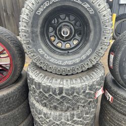 15" American Racing Baja Wheels (5x115) with 33" Goodyear Wrangler Tires