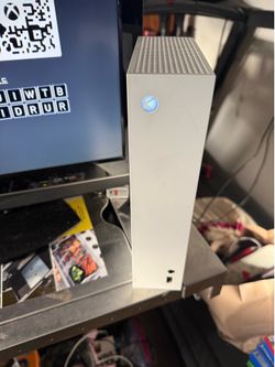 Xbox Series S with controller and headset