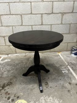 Small wooden table in 2 parts.