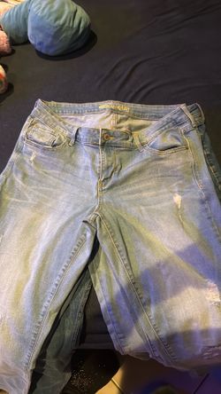 Blue  jeans 5 for    $25. Dólar
