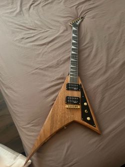 Jackson rhoads flying v guitar