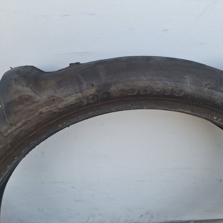 Snobby Motor Cyle Tire And Pair Of Off Road Riding Boots $50