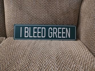 EAGLES FANS "I BLEED GREEN" METAL SIGN.  16" X 4".  NEW.  PICKUP ONLY.