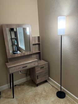 Vanity Table with Lighted Sliding Mirror.