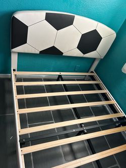 Upholstery  bed frame with soccerball design headboard