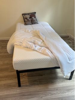 Brand new twin bed with frame