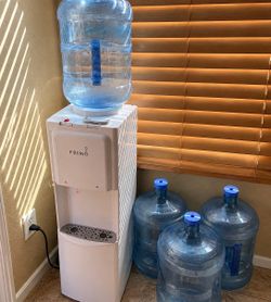 Primo Hot & Cold Water Dispenser + 4 Five-Gallon Jugs