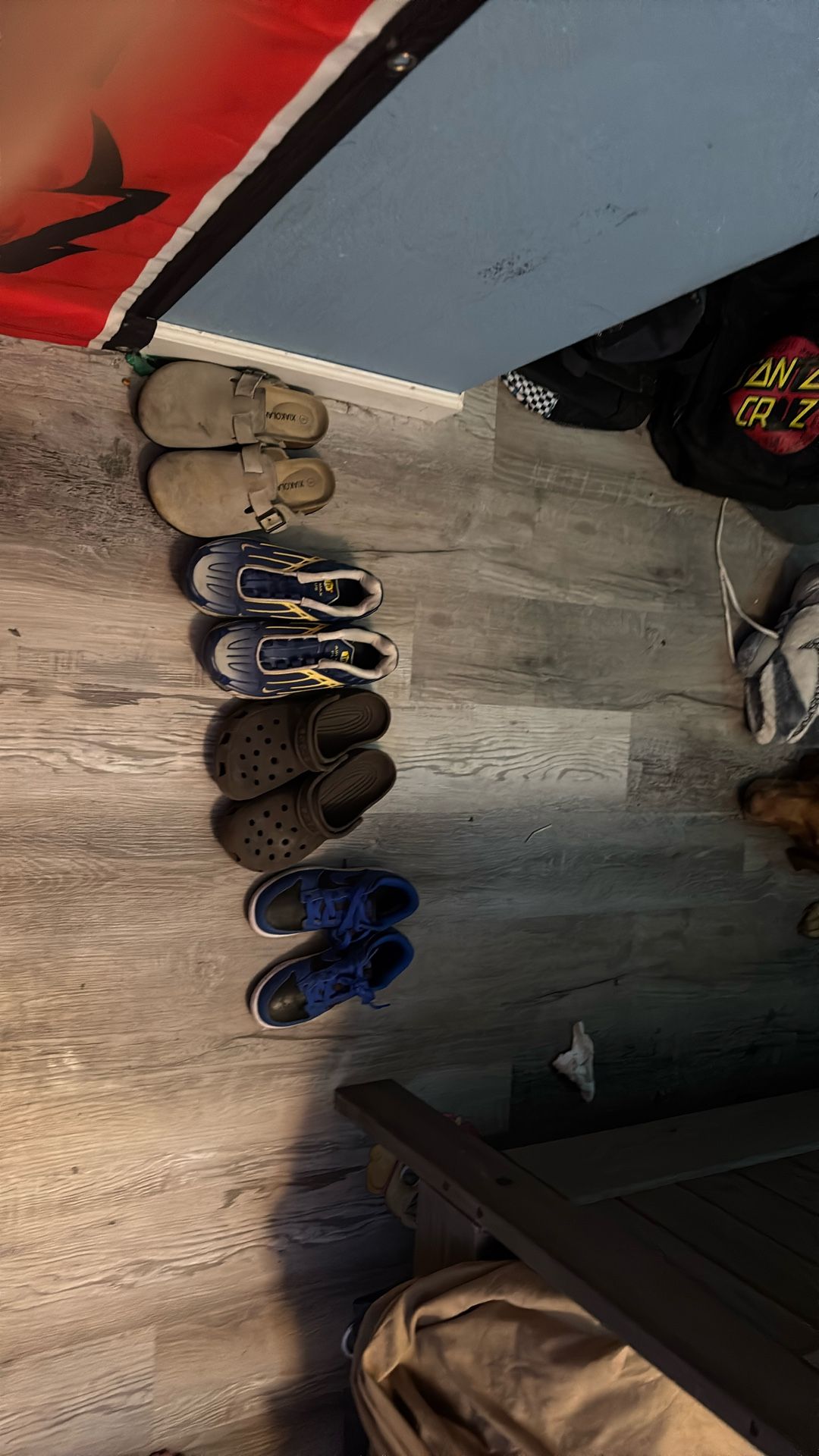 Blue And Black Dunks, Brown Crocs, Blue And Yellow TN and fake Birkenstocks