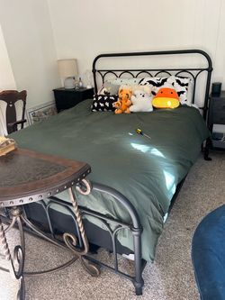 Queen size bed and mattress.