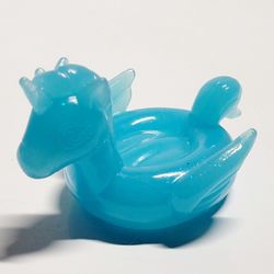 Hatchimals CollEGGtibles Unicorn Family Translucent Unicorn Pool Float Accessory. The object in the image is indeed a Hatchimals CollEGGtibles Unicorn