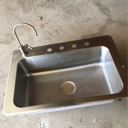Kitchen sink stainless steel good condition $80.79 inches long what 32