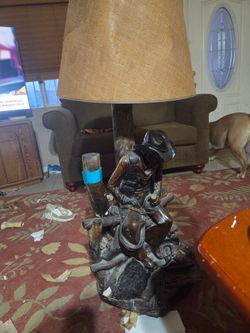 Large cowboy lamp and statue