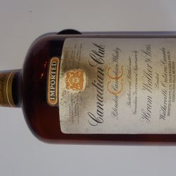 Empty 1984 Canadian Club Whiskey Bottle