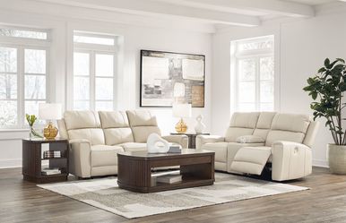 100% leather power recliner sofa and loveseat by Ashley