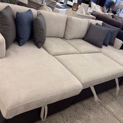 Beautiful Sectional With Pull Out Sleeper And Storage 